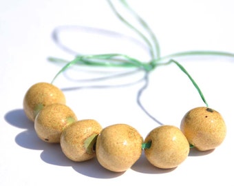 Handmade Ceramic Beads Round in TanBrown with a Green Shade