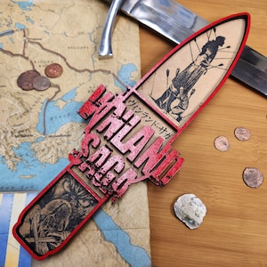 Thorfinn's dagger laser engraved artwork. Made with MDF and acrylic paint. Designed to show the rage and grief of Thorfinn in Season One of Vinland Saga. Ready to hang.