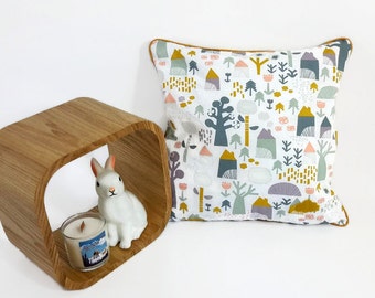 Removable square cushion for baby's room, in printed cotton fabric ochre and white , "Scandinavian"theme, hand-made in France.
