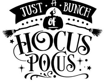 May include: Black and white graphic design with the text "Just a bunch of Hocus Pocus" with a pumpkin and broomsticks.