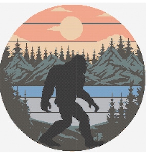 May include: A silhouette of Bigfoot walking through a forest with a sunset in the background. The forest is filled with trees and mountains. There is a lake in the foreground.