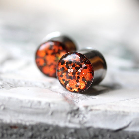 Items similar to Halloween Ear Gauges, Orange Glitter Gauges, Autumn