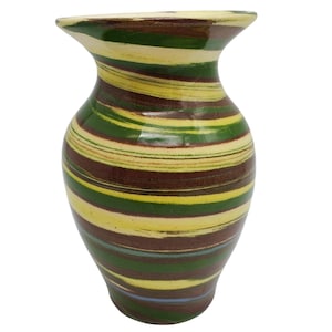 May include: A ceramic vase with a wide mouth and a bulbous body. The vase is decorated with horizontal stripes in shades of brown, green, yellow, and cream. The vase is approximately 10 inches tall.