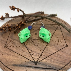 The SteamTech Skull earrings.