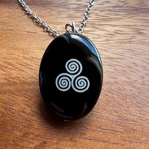 Spiral Of Life -- Black Onyx Spiral Engraved Pendant
