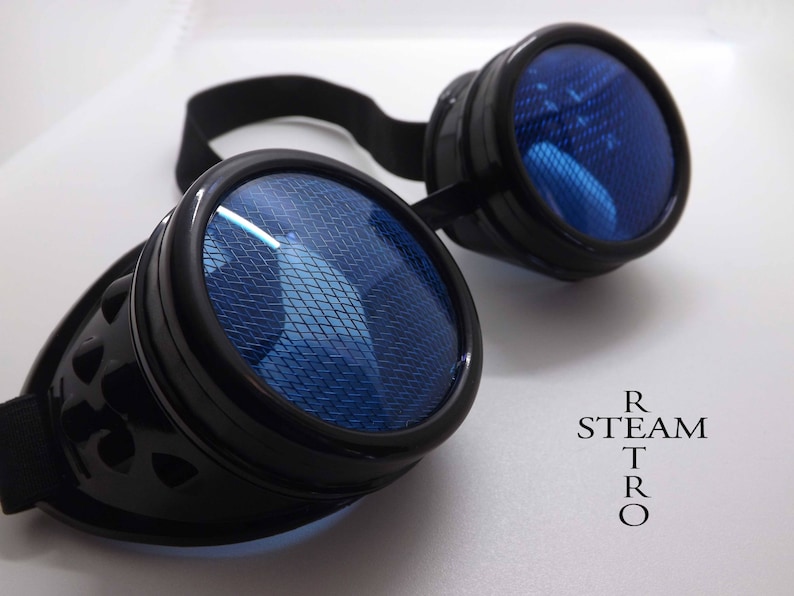 May include: Black steampunk goggles with blue mesh lenses. The goggles have a black leather strap and are designed with a retro aesthetic.