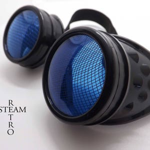 May include: Black steampunk goggles with blue mesh lenses. The goggles have a black elastic strap and a metal frame.