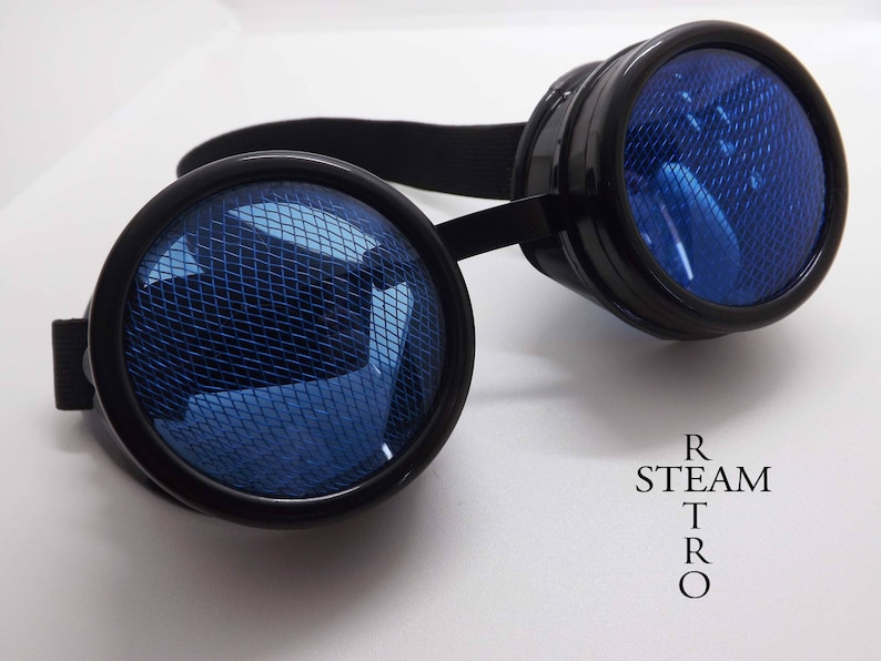 May include: Black steampunk goggles with round blue lenses featuring a mesh pattern. The lenses are set in black frames with a black headband.