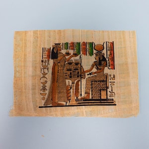 Nefertari offering Egyptian Papyrus