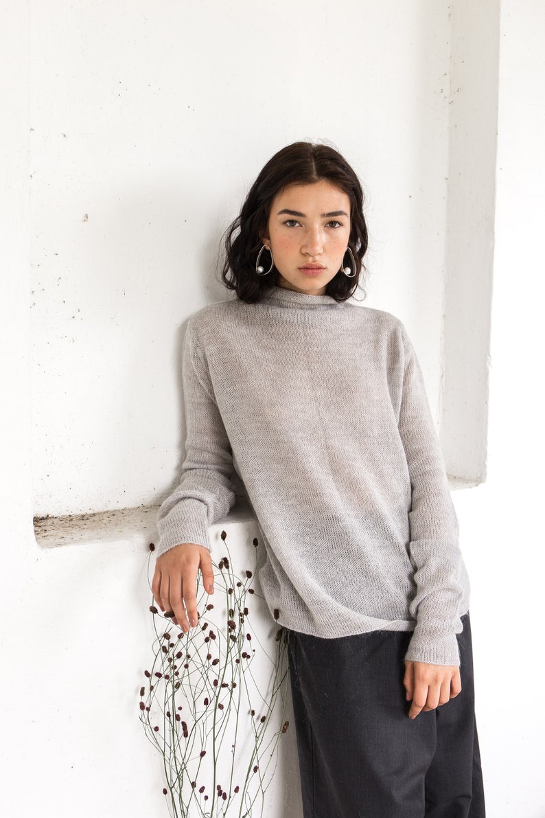 Kabel gebreide jurk. Minimalistische jurk. Oversized jurk. Hoge hals jurk. Cowl hals jurk. Tuniek jurk. oversized trui. Losse kleding. Kabel gebreide jurk. Minimalistische jurk. Oversized jurk. Hoge hals jurk. Cowl hals jurk. Tuniek jurk. oversized trui. Losse kleding.