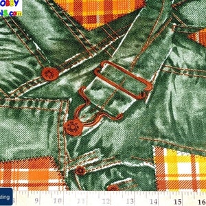 May include: Green fabric with a patchwork design featuring denim, plaid, and a large buckle. The fabric is textured and has a distressed look.