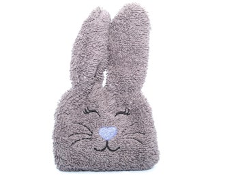 Boo Boo Bunny ice pack for kids pain relief and comfort, closed eyed girl bunny with lashes.