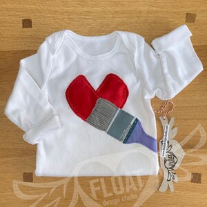 FLOAT&#39;s &quot;Paint The Town Red&quot;..(Onesie/Bodysuit) #Heart, #Paint, #Love, #Valentine, #ValentinesDay, #Art