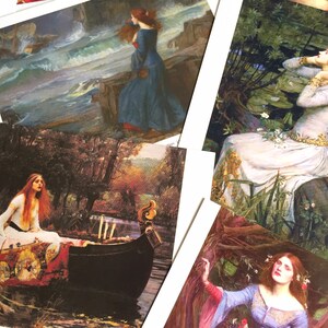 May include: A collection of five vintage art prints featuring women in various settings. The prints are framed in white and have a matte finish. The images depict women in a variety of poses and clothing, including a woman in a blue dress standing on a rocky shore, a woman in a white dress sitting in a forest, and a woman in a red dress sitting in a boat.