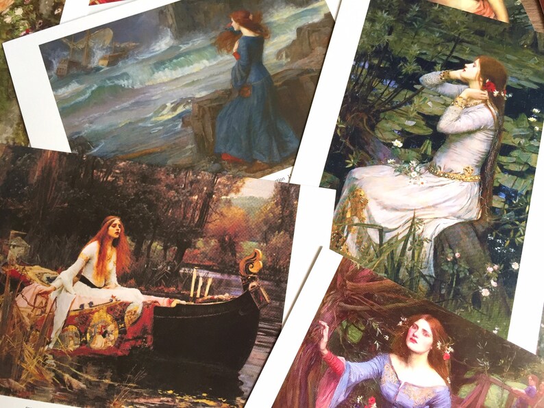 May include: A collection of five vintage art prints featuring women in various settings. The prints are framed in white and have a matte finish. The images depict women in a variety of poses and clothing, including a woman in a blue dress standing on a rocky shore, a woman in a white dress sitting in a forest, and a woman in a red dress sitting in a boat.