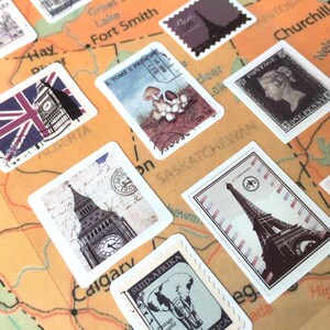 May include: A collection of vintage postage stamps featuring various landmarks and designs. The stamps are arranged on a map with the names of Canadian cities and provinces. The stamps feature images of Big Ben, the Eiffel Tower, and a mushroom.