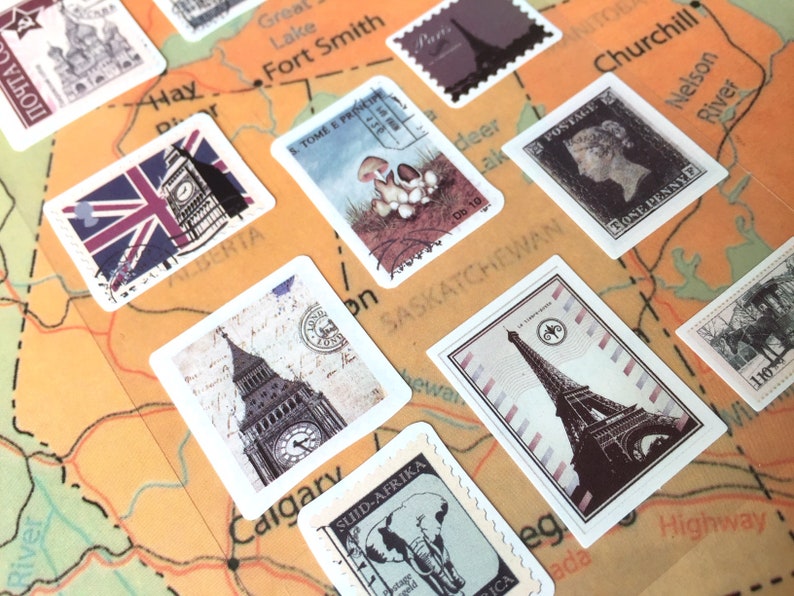 May include: A collection of vintage postage stamps featuring various landmarks and designs. The stamps are arranged on a map with the names of Canadian cities and provinces. The stamps feature images of Big Ben, the Eiffel Tower, and a mushroom.