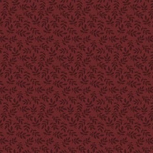 roter Stoff von Moda, Muster; Zweige mit Blätter ca. 3 cm lang, Farben:  rot-brombeer, 100% Baumwolle, Stoffbreite: 110 cm