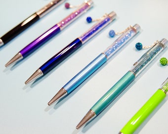 Crystal Ballpoint Pen with Dangling charms Filled With Swarovski Crystal Elements.