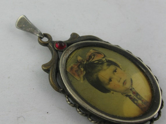 Ancient photo pendant with a red gemstone. Portra… - image 5