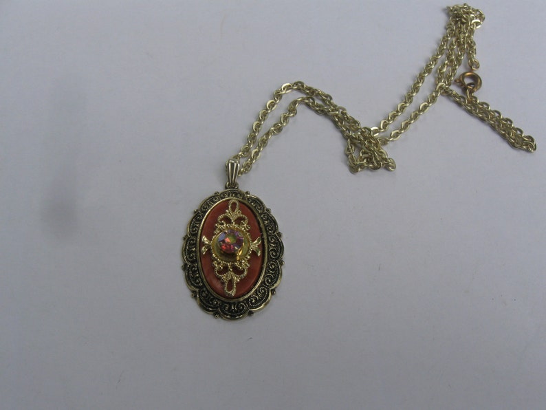 Vintage Shrill FASHION JEWELRY pendant on a gold chain More kitschy is hardly possible :- Marked GERMANY