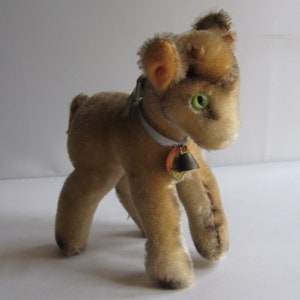 Original STEIFF 6314,00. Plush toy Zicky goat. Height about 14 cm. With chest tag, button and tag. Made in Germany. 1959 to 1967. VINTAGE