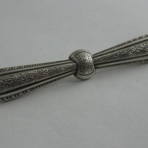 ART NOUVEAU silver brooch "loop" made of silver 800 Ag. Stylized Art Nouveau ornamentation. Marked: Luri. VINTAGE