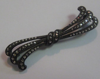 Marcasite loop. Ancient silver brooch (835 Ag). Vintage