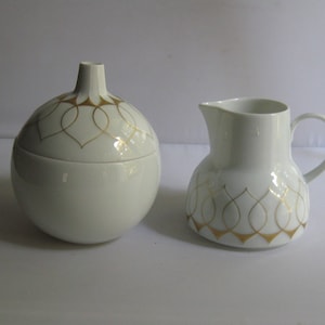 Rosenthal studio line Germany. Lotus gold silhouette. Milk and sugar set: sugar bowl and milk jug. Designed by Bjoern Wiinblad. Vintage
