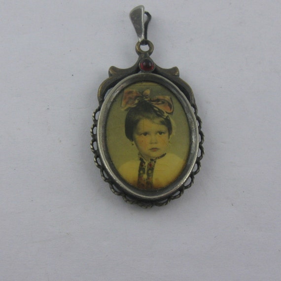 Ancient photo pendant with a red gemstone. Portra… - image 3