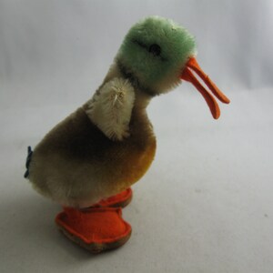 Original STEIFF 6311.07. Plush toy / stuffed animal: DUCK / mallard duck, 11 cm. With button and flag. Made in Germany. 1960s. VINTAGE toy
