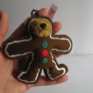 Original STEIFF 023132 plush toy: Teddy bear light brown, 22 cm. With button and flag. Made in Germany 1995-2003. VINTAGE toy collectible
