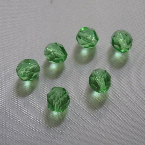 Genuine Czech facetted uranium glass beads. Approx. 8mm. Green - transparent. 6 pieces. 1940s vintage beaded treasure