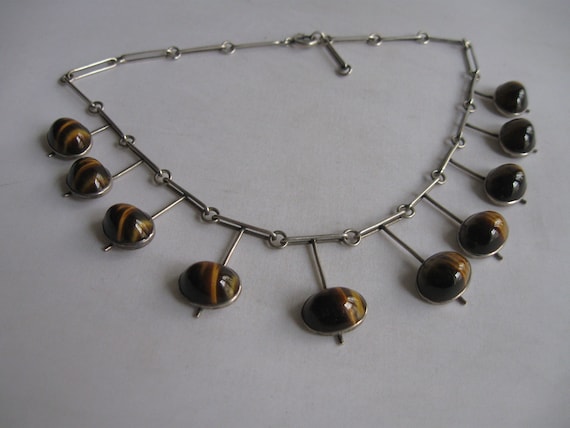 Modernismus Silber Collier. Halskette aus Sterlingsilber 925 Ag mit ausdrucksstarken Tigerauge Cabochons. Vintage Silber Schmuck