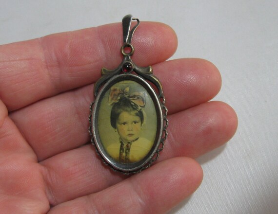 Ancient photo pendant with a red gemstone. Portra… - image 9