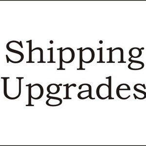 May include: Text that reads "Shipping Upgrades" in black text on a white background.