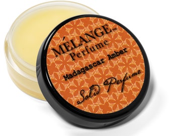 Melange Madagascar Amber Solid Perfume Single - NEW! .56 ounces. Base of Beeswax/Jojoba Oil.  CRUELTY FREE
