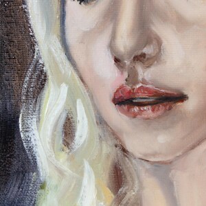 May include: Close-up of a woman's face with blonde hair. Her eyes are closed and her lips are slightly parted. The painting is done in a realistic style with visible brushstrokes.
