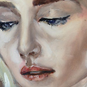 May include: A close-up of a woman's face with soft, natural makeup. Her eyes are closed and her lips are slightly parted. The painting is done in a realistic style with subtle brushstrokes.