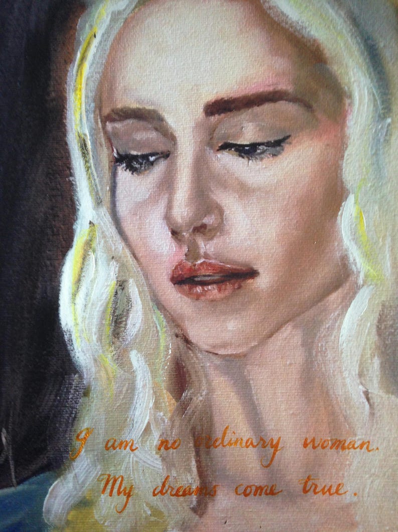 May include: A painting of a woman with long blonde hair. She is looking down with a sad expression. The text "I am no ordinary woman. My dreams come true." is written in gold lettering on the bottom of the painting.