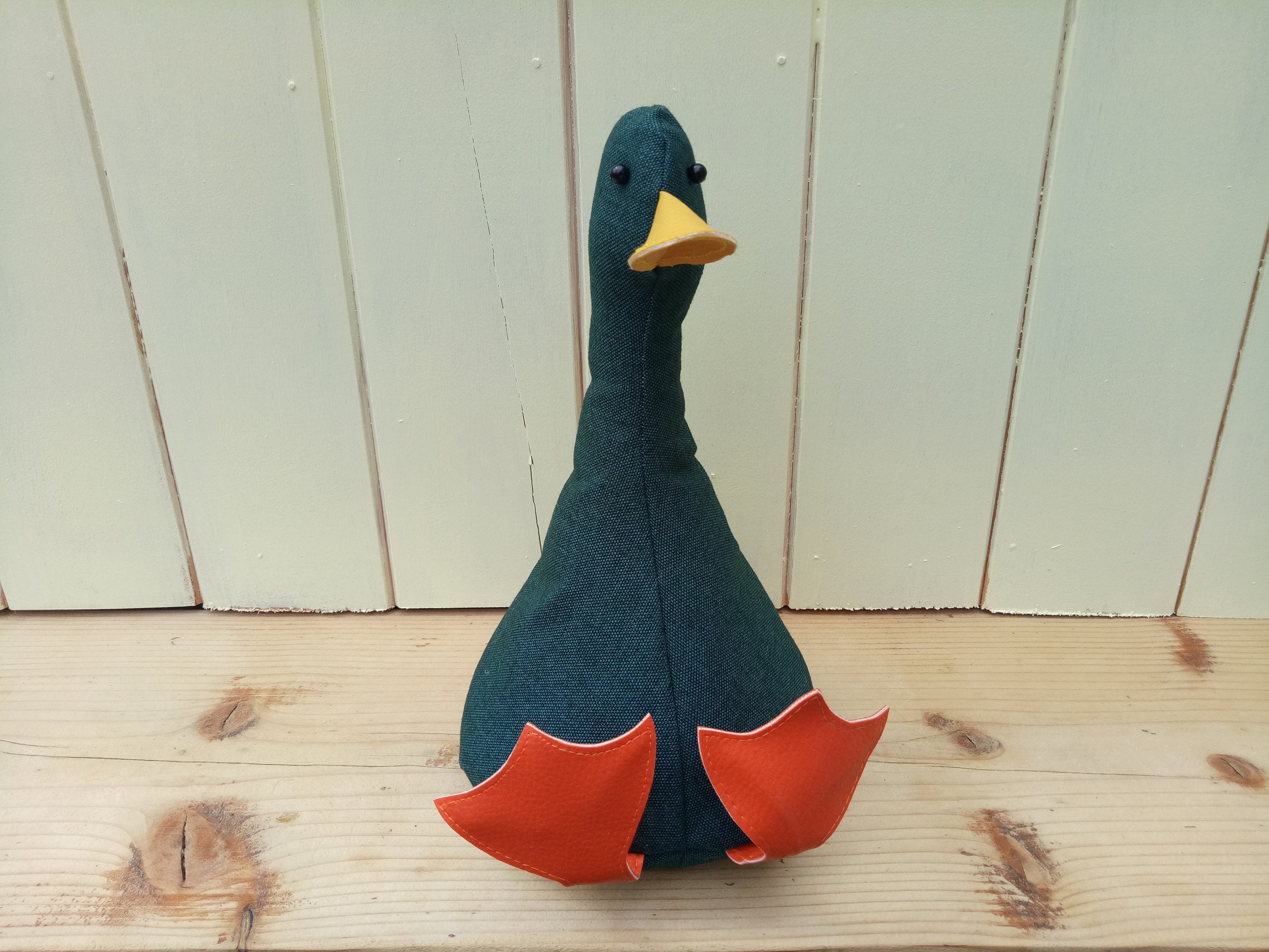 Sujetapuertas Canard. Pato verde azulado. Embalaje plano. Diseño a elegir. Divertido tope de puerta con decoración de pato. Regalo original para inauguración de casa.