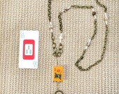 Eyeglass Chain or Necklace with vintage MAH JONGG Bakelite 3 flower tile. Jasper, Czech glass shell seed beads. Brass chain links. 3 Bam