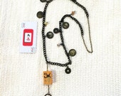 Eyeglass Chain or Necklace with vintage MAH JONGG Bakelite 4 flower tile. Jasper beads. Brass coins. Brass chain links. 9 Crak