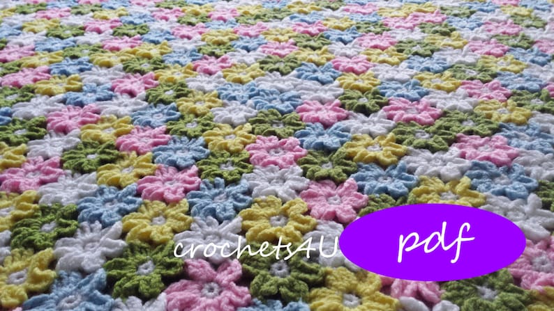 May include: A crochet blanket with a repeating pattern of colorful flowers in shades of pink, blue, yellow, and green. The blanket is made with a soft, textured yarn and has a delicate, feminine feel. The text "crochets4u" is visible in the lower left corner of the image. The word "pdf" is written in white letters on a purple oval.