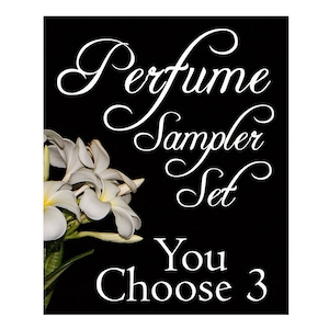 May include: Black and white image with white flowers and text that reads "Perfume Sampler Set You Choose 3".