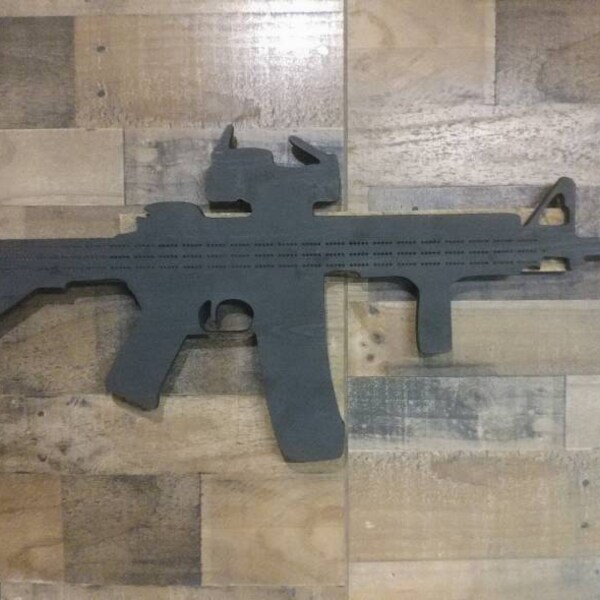 Cribbage Board in the shape of an AR-15 with 3 player track