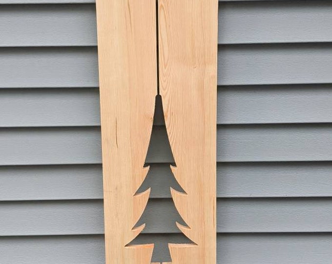 Board and batten window shutter with Large Pine Tree cutout. Indoor or Outdoor. Custom shutter height, width and design to fit your windows