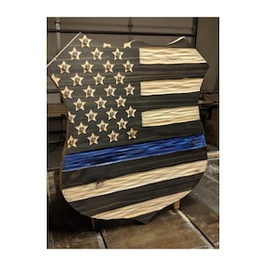 Thin Blue Line Police badge carved in wood with unique chisel texture that you won&#39;t find elsewhere