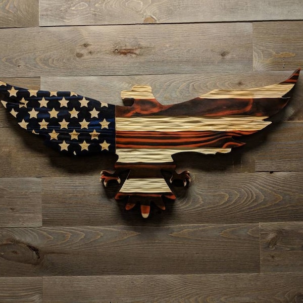 Carved wooden American flag eagle with unique chisel texture.