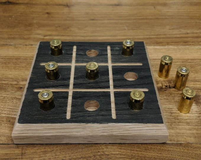 Tic Tac Toe board game great for 2 player fun. Tic-Tac-Toe peg game with ammo casing pegs